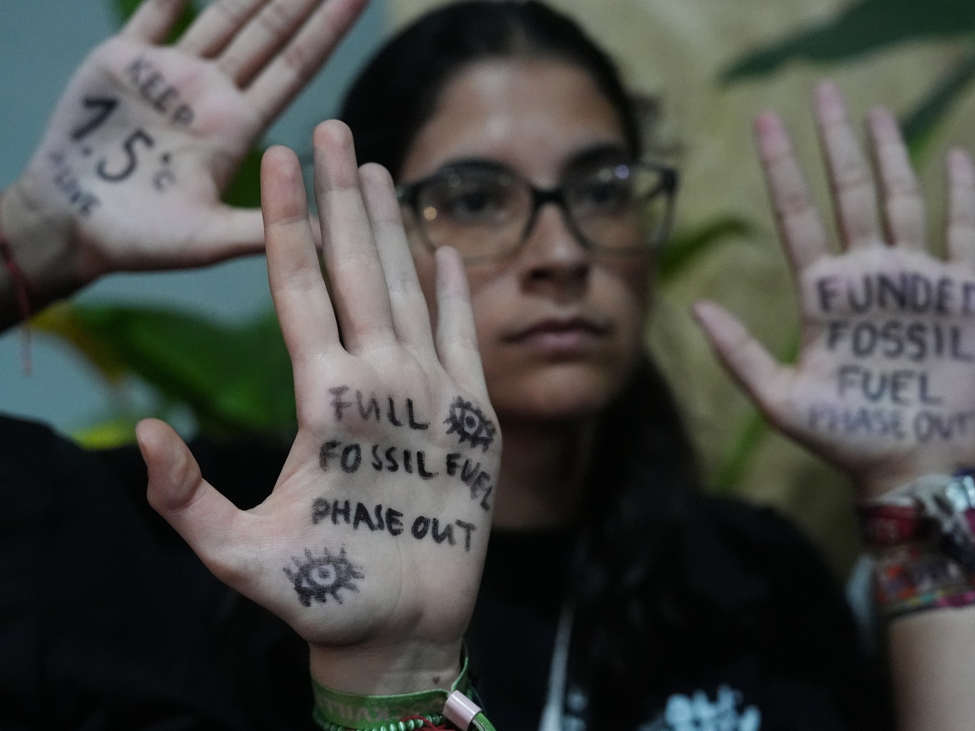 UN climate talks go into overtime as divisions over fossil fuels persist