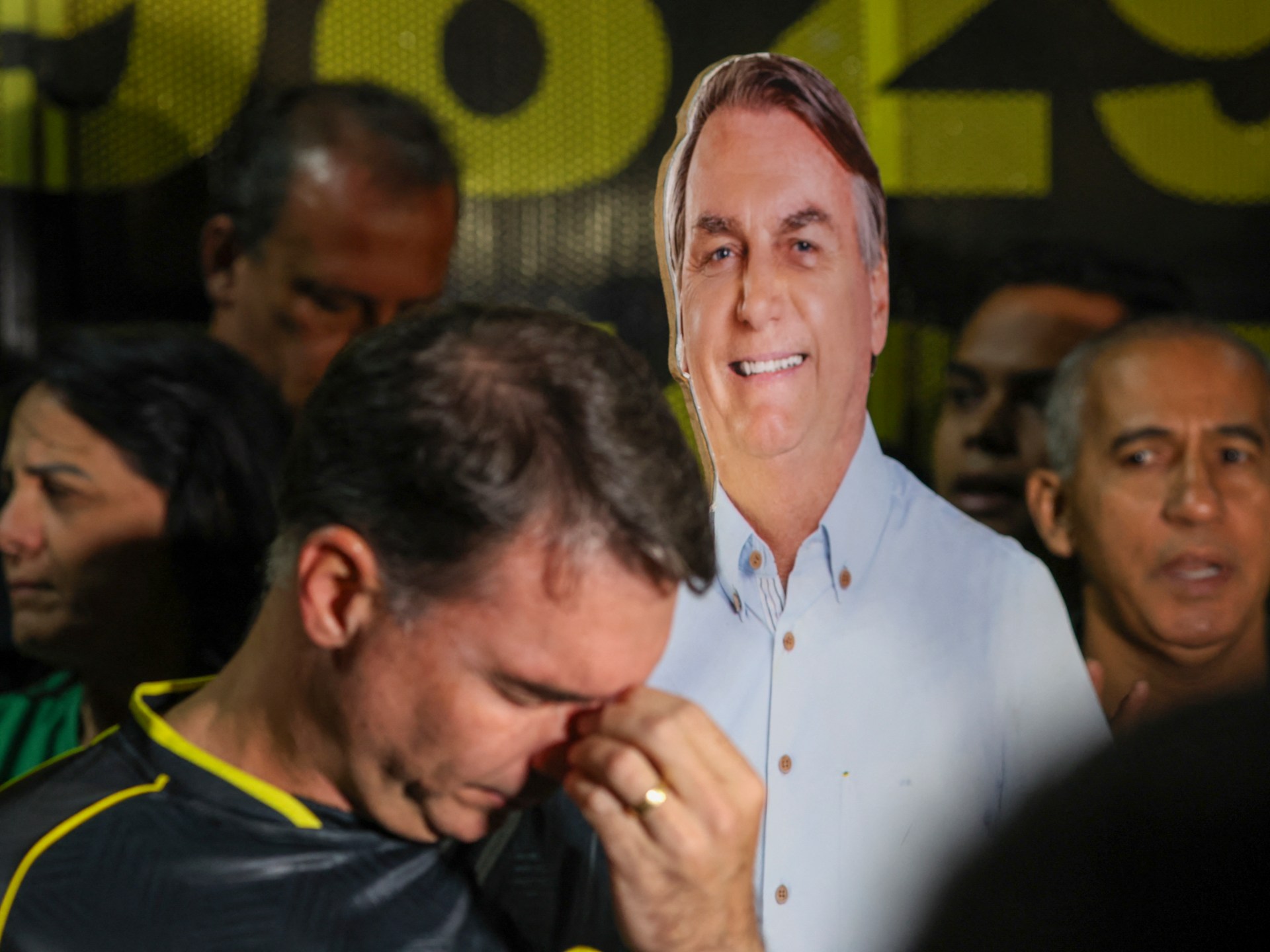 Bolsonaro says hallucinatory effects of meds made him tamper with ankle tag