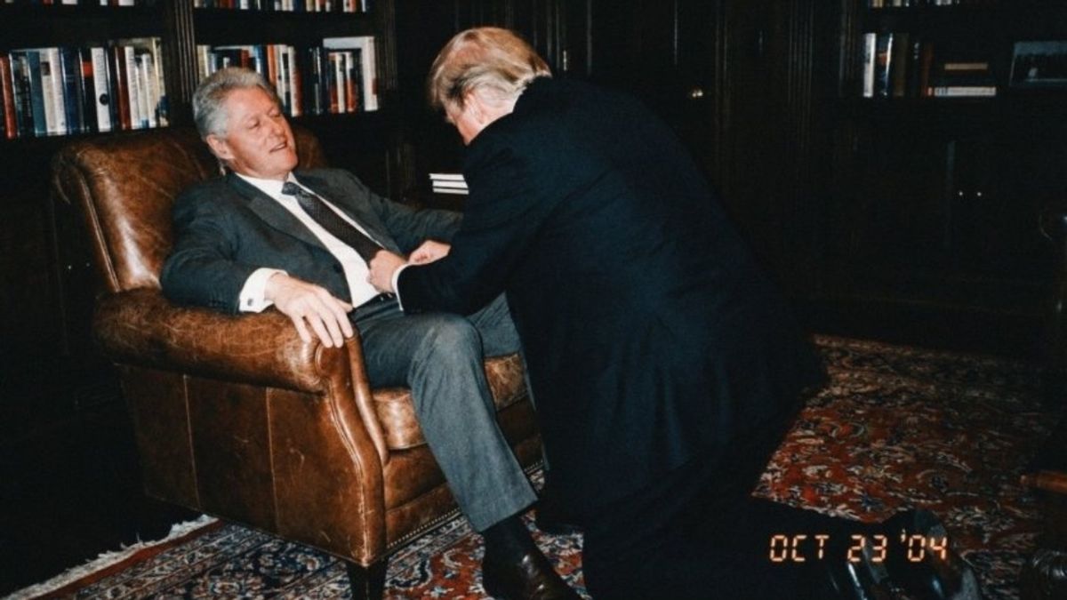 Photo of Trump kneeling, removing Clinton’s pants isn’t what it seems