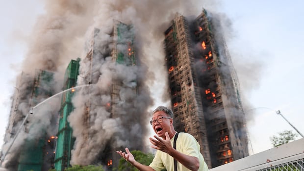 Hong Kong highrise fire leaves at least 4 dead, with reports of residents trapped