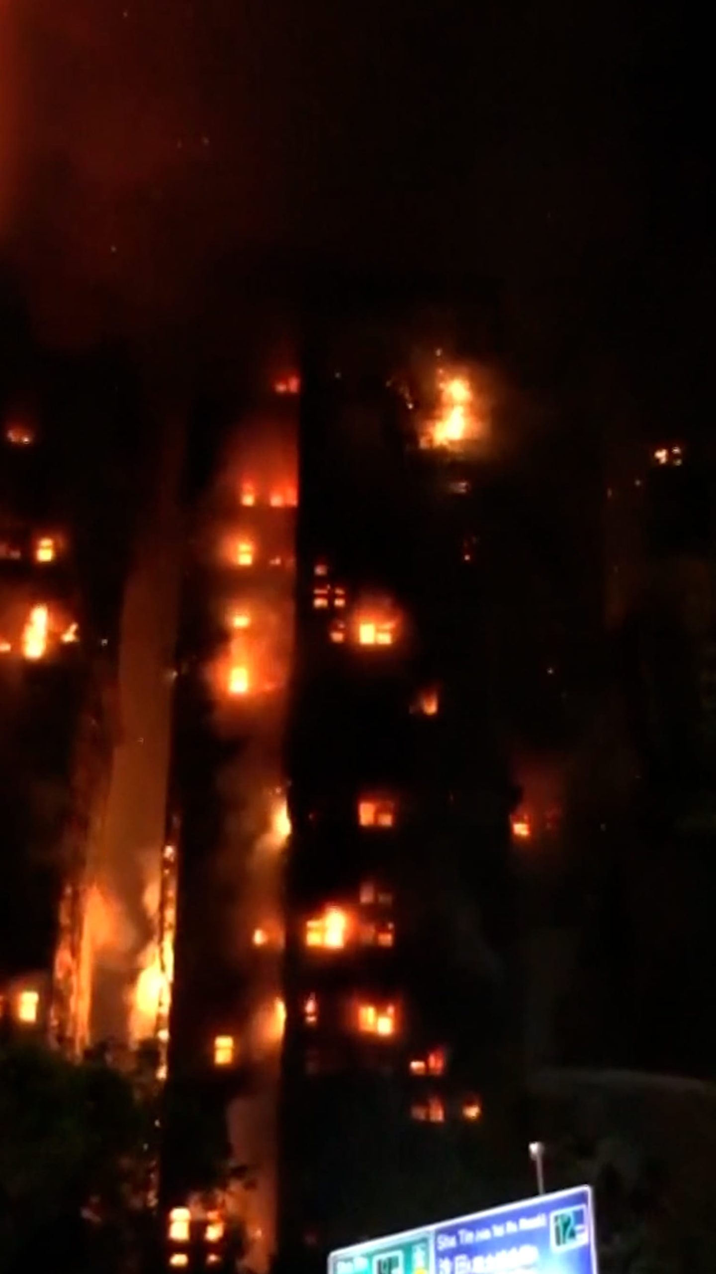 Dozens killed after fire engulfs Hong Kong high-rise