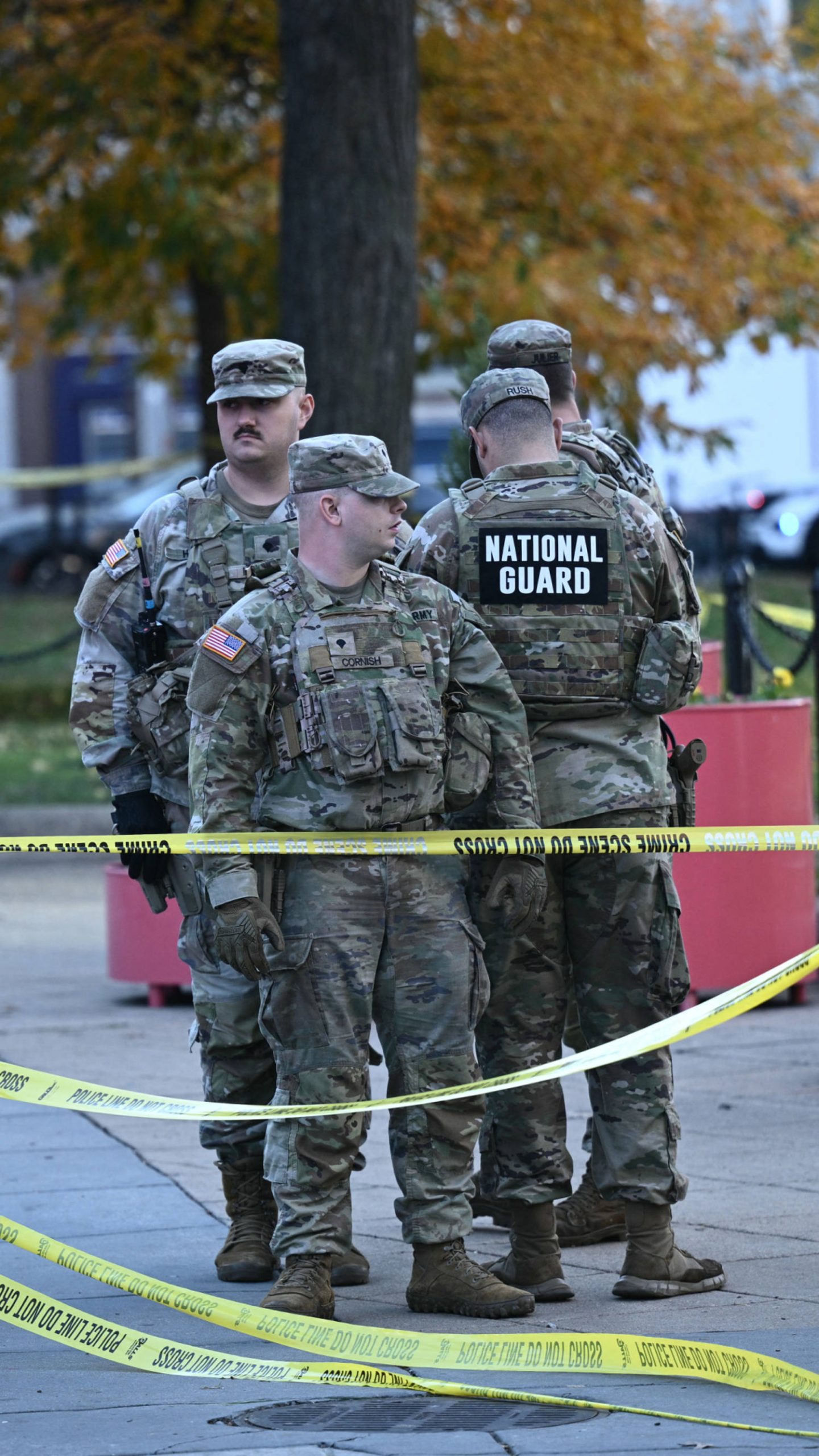 Officials describe shooting of 2 National Guard members