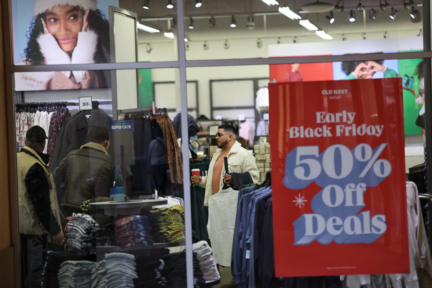 Black Friday shoppers spend more time looking for deals but less money amid economic angst