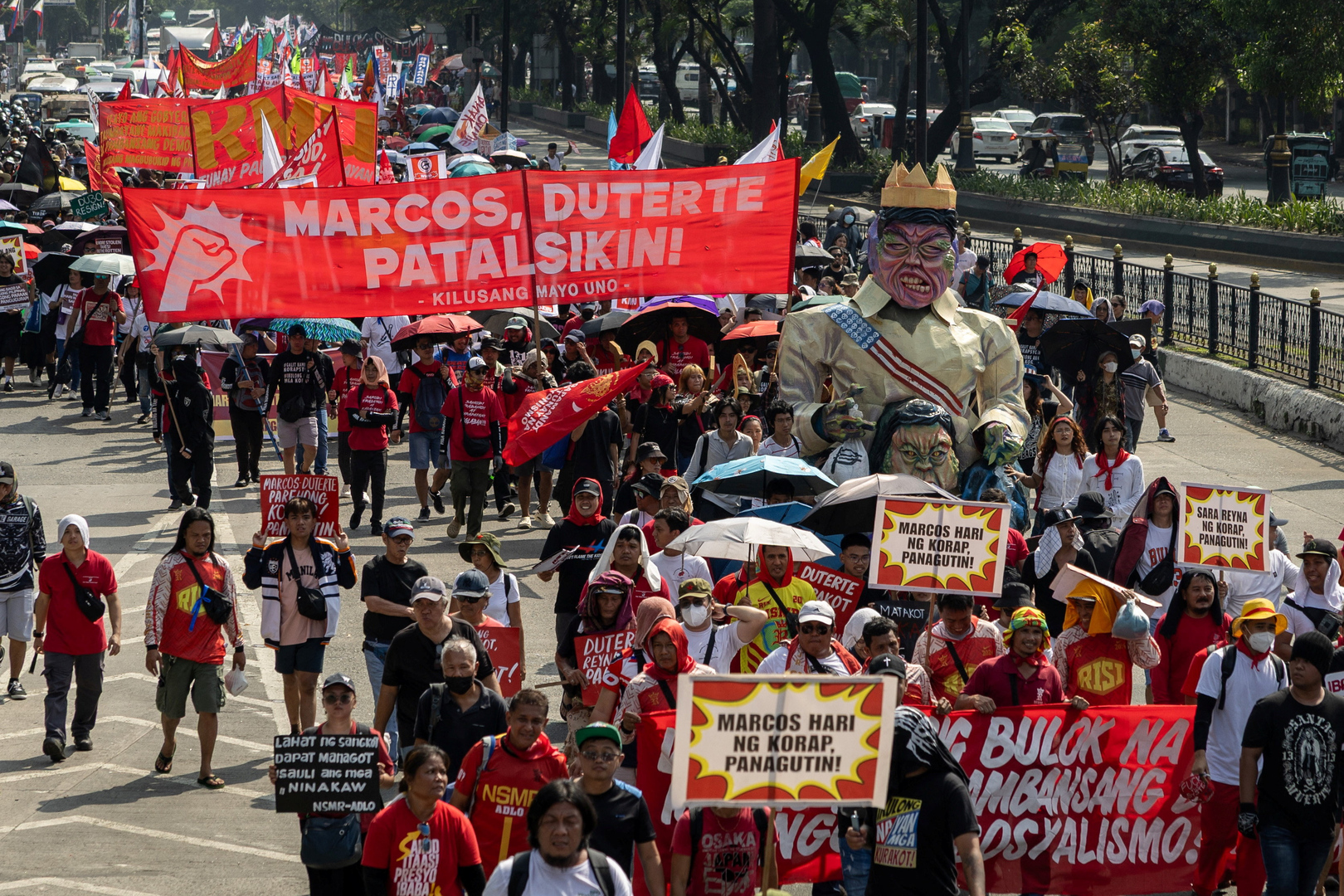 Thousands of anti-corruption protesters in Manila say Marcos must resign