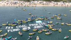 Climate protesters in kayaks disrupt operations at Australian port