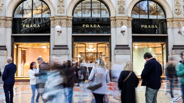 Italian fashion group Prada buys rival Versace