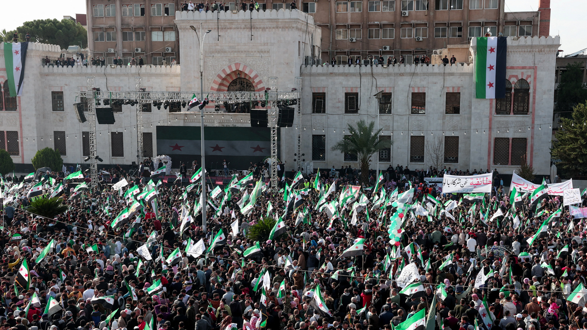 Crowds gather in Hama, Syria, to celebrate one year of liberation