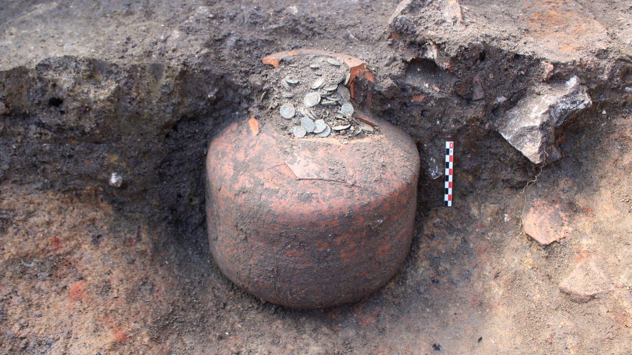 1,800-year-old ‘piggy banks’ full of Roman-era coins unearthed in French village
