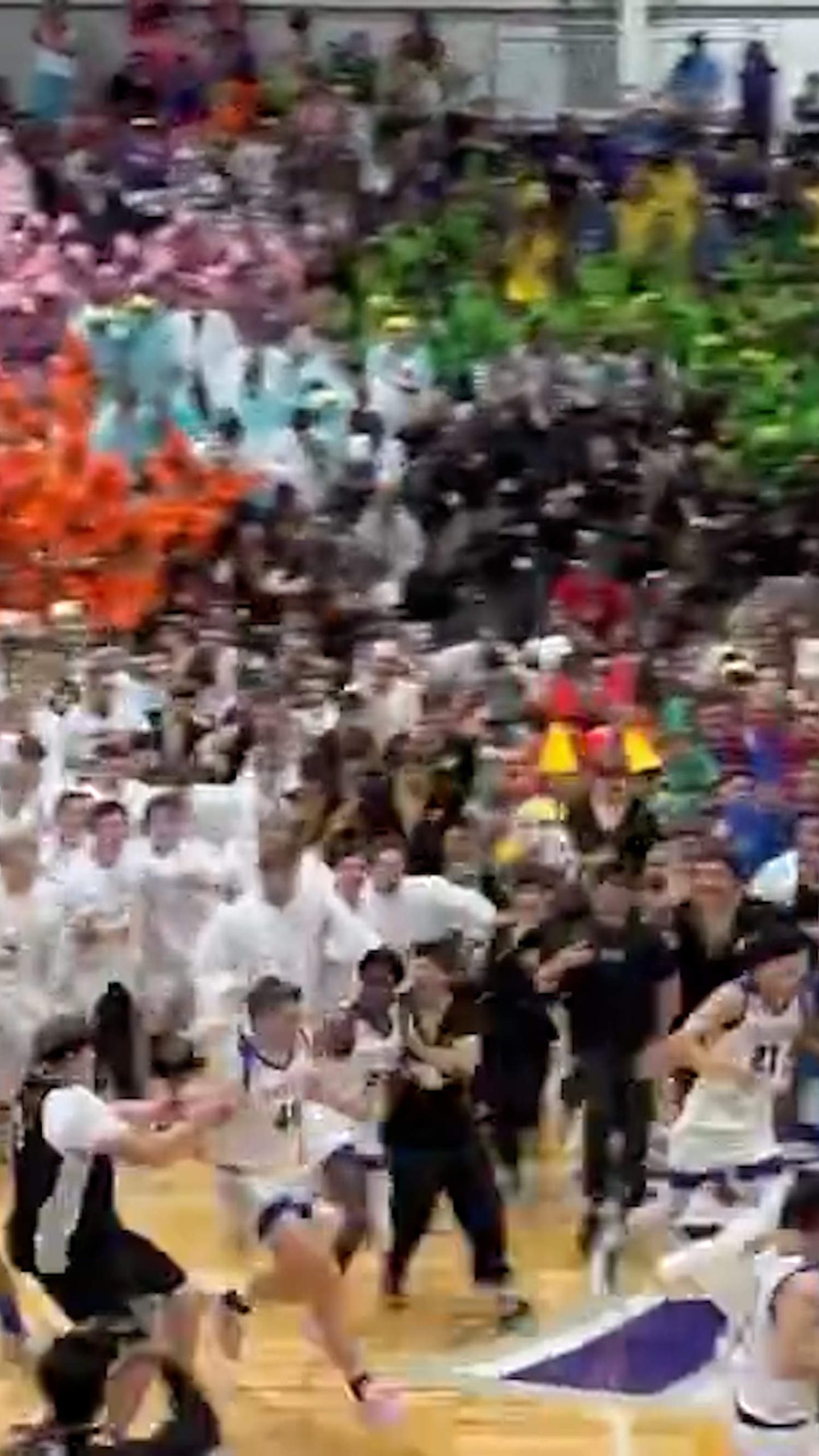 Crowd goes wild at ‘Silent Night’ basketball game