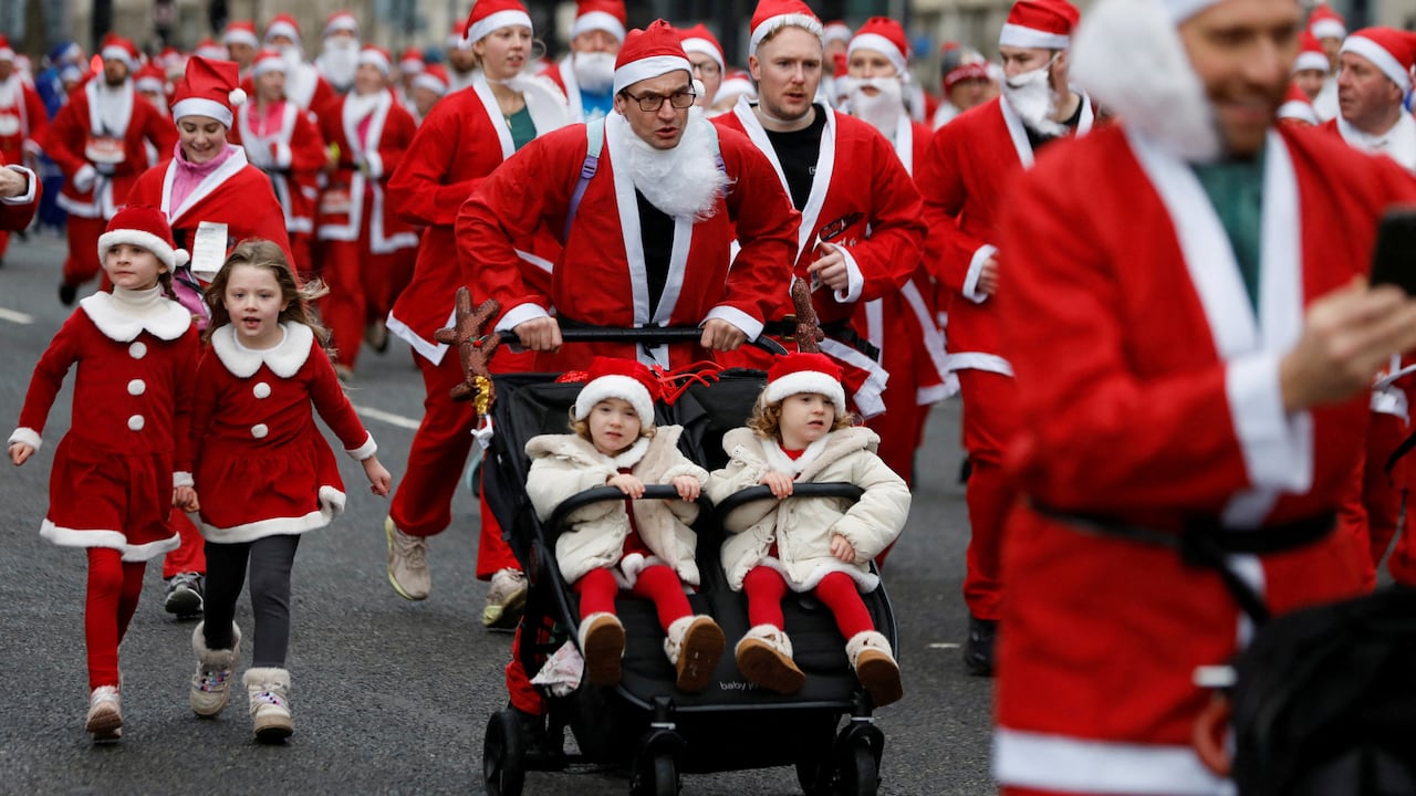 Thousands of Santas dash through Liverpool streets for charity
