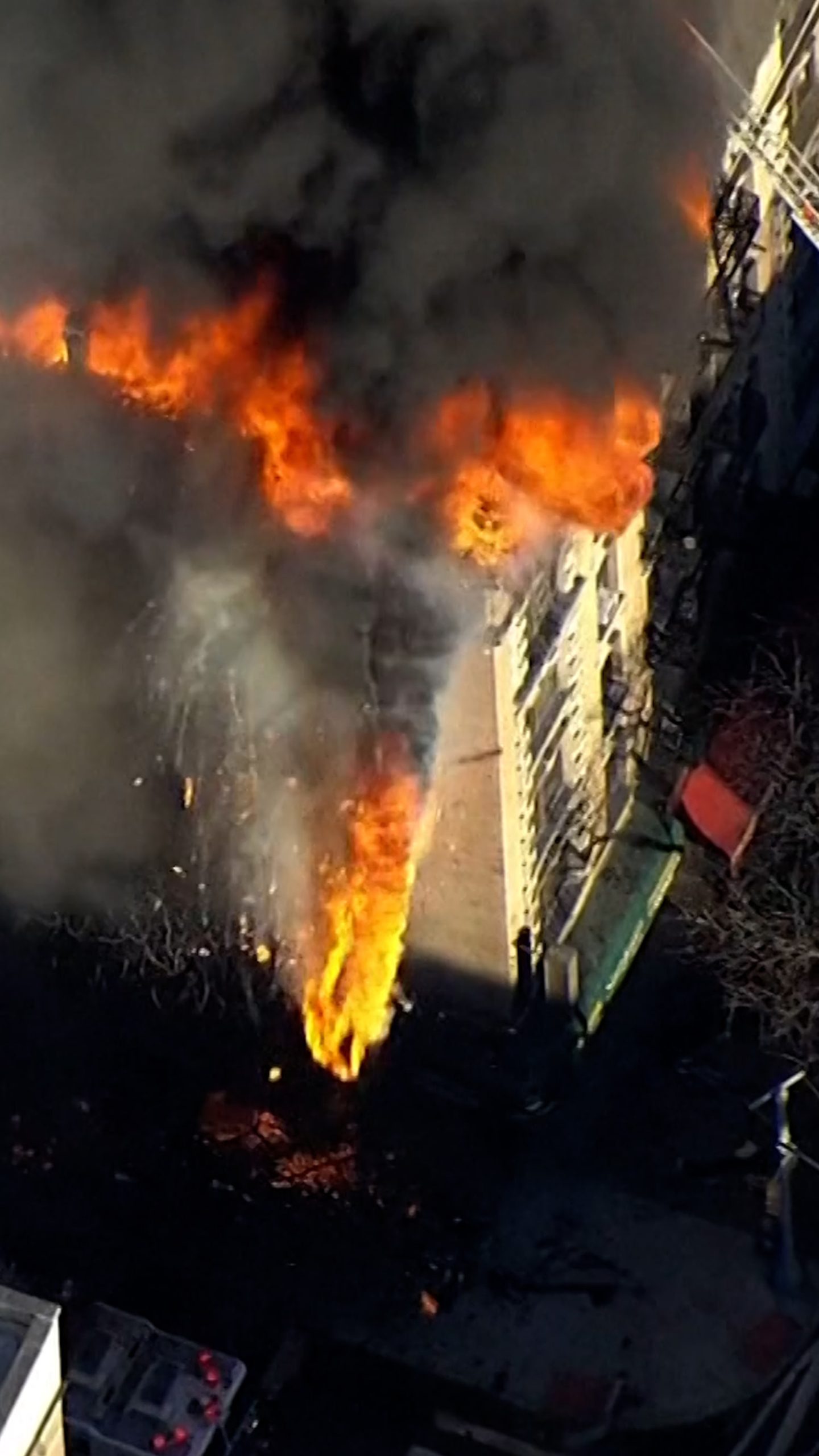 Debris falls from burning NYC apartment building