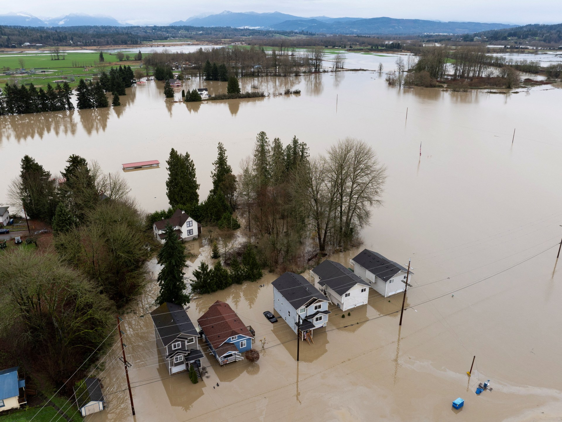 ‘Catastrophic flooding’ in North America’s Pacific Northwest as rains ease