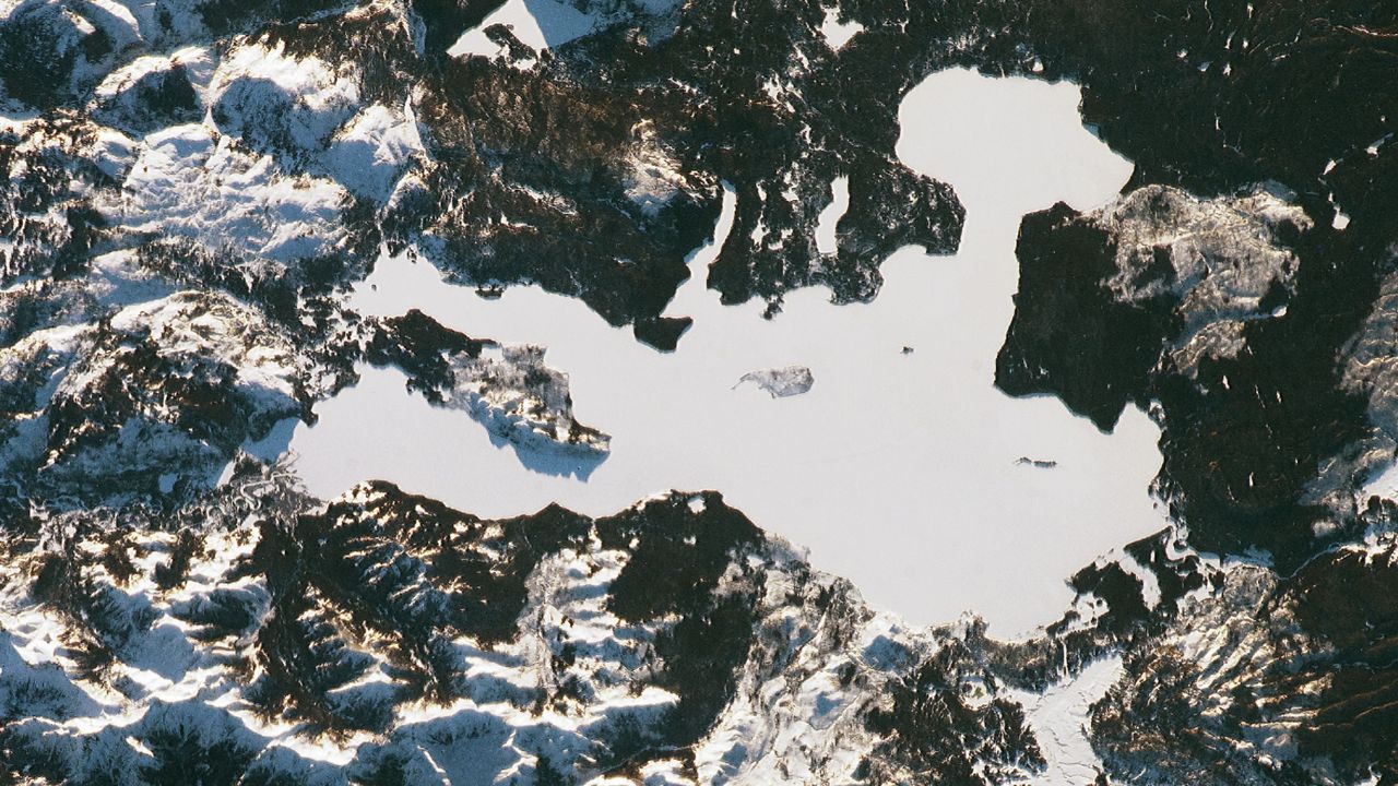 Deep snow blanket transforms Yellowstone Lake into a giant white void — Earth from space