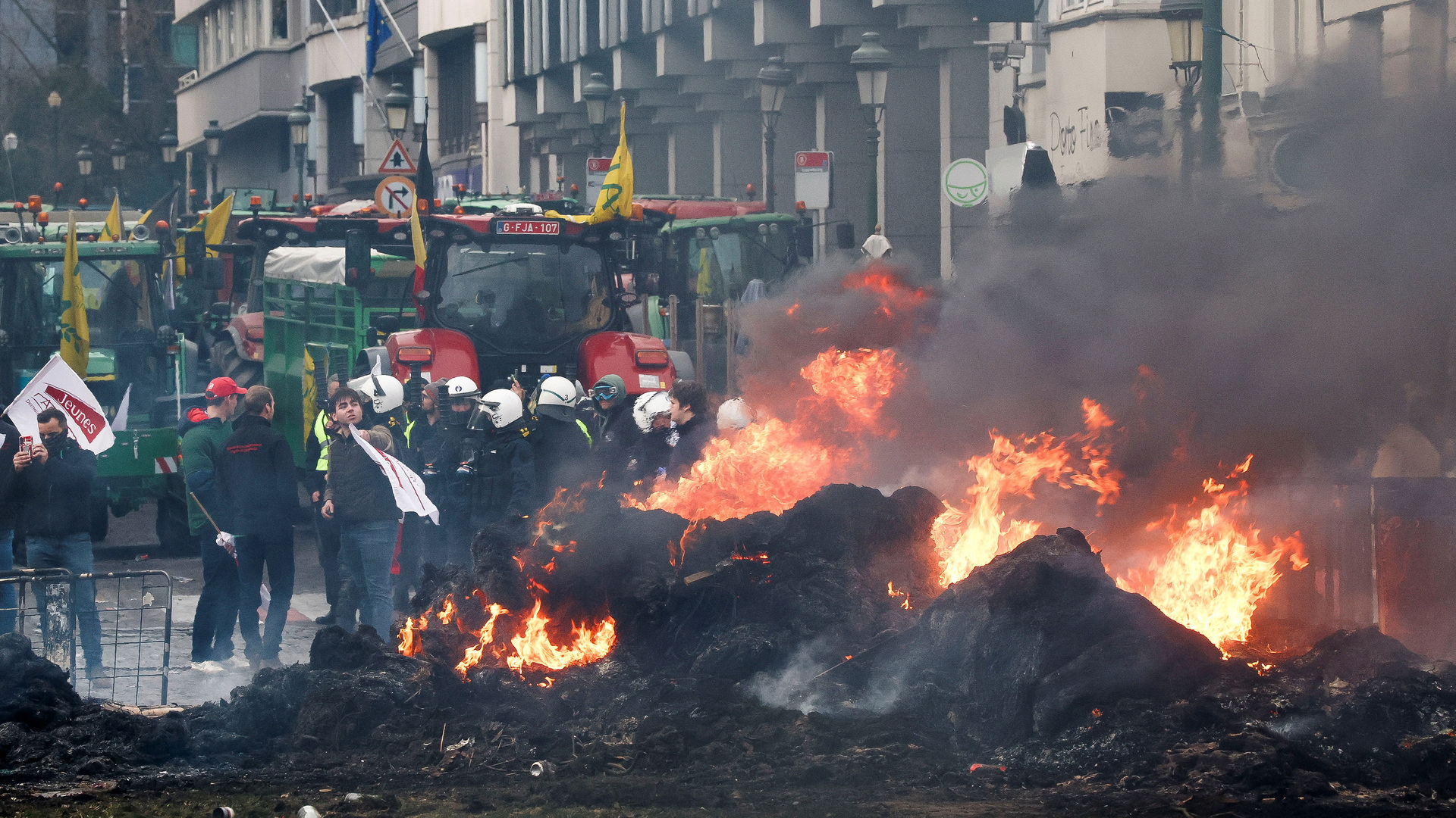 Protesting farmers clash with police as EU debates trade deal