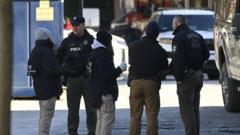 Police issue arrest warrant for suspect in Brown University attack, sources say