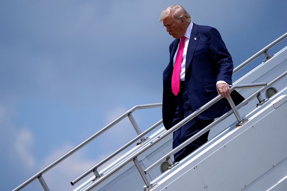 ‘Trump can barely walk!’: Critics sound alarm as president ‘struggles’ down stairs