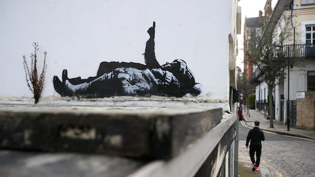 Banksy unveils new art depicting stargazing figures in London