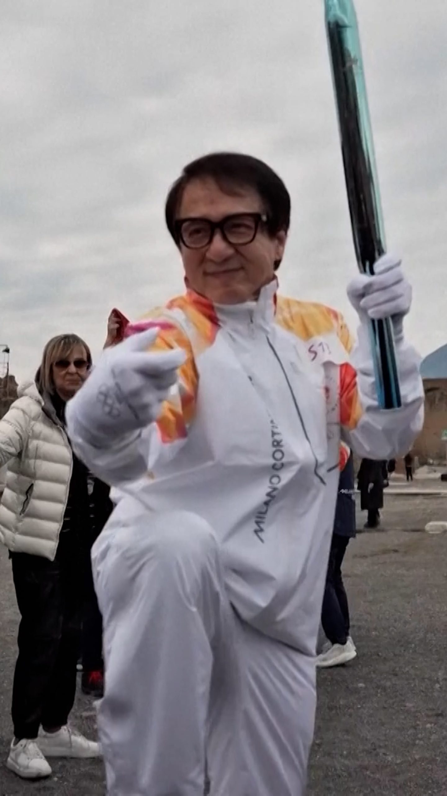 Jackie Chan carries the Olympic Torch through Pompeii