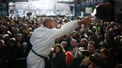 Waterskiing Santas and giant cuts of meat: Christmas around the world