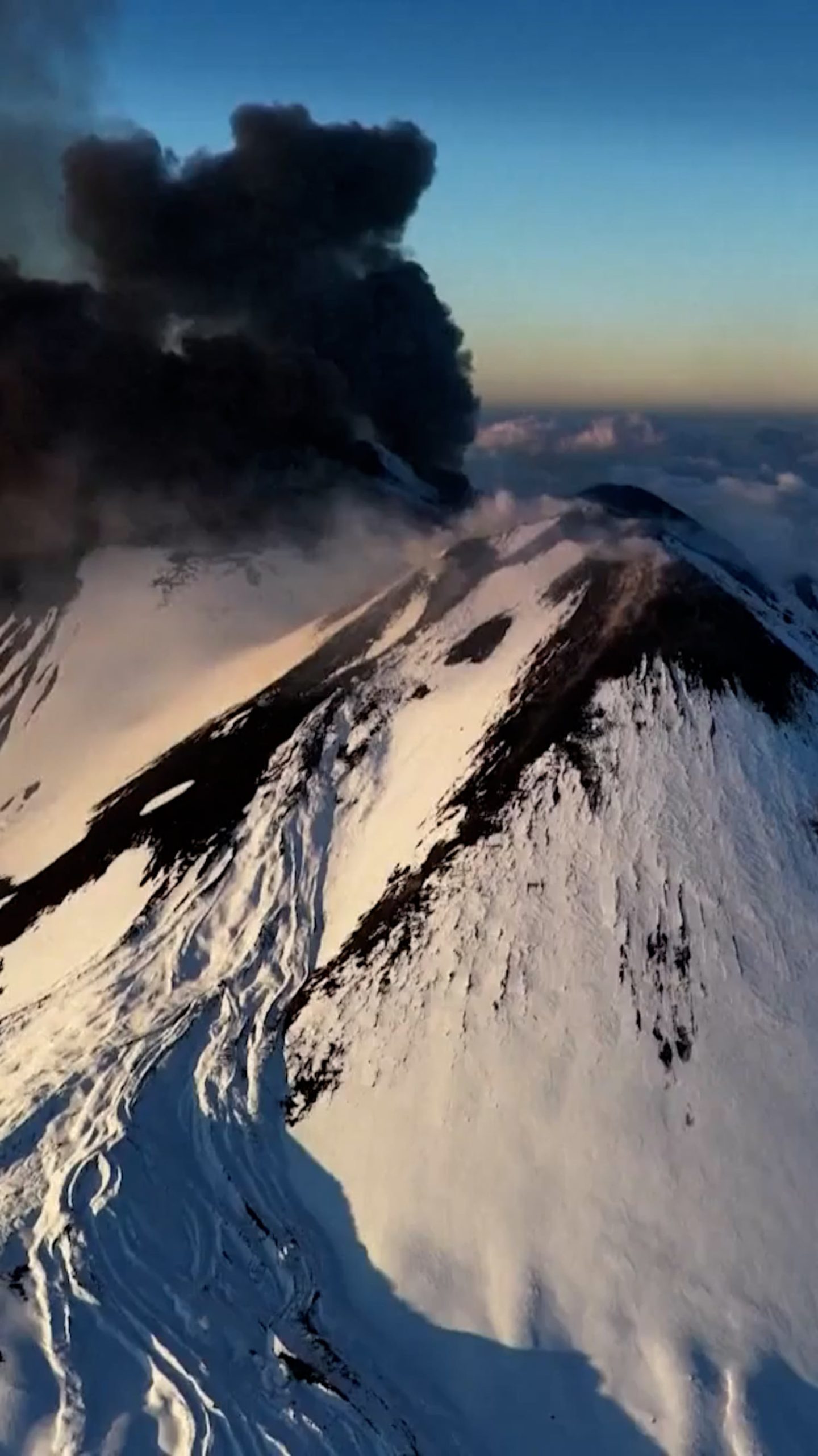 Aerial video captures eruption of snowy Mount Etna