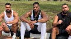 Anthony Joshua injured in Nigeria car crash that killed two team members