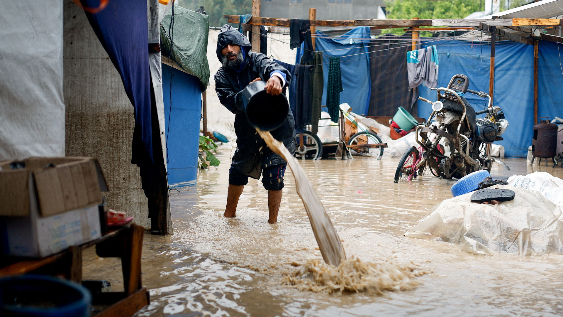 Displaced Palestinians lose shelters as heavy rain floods camp