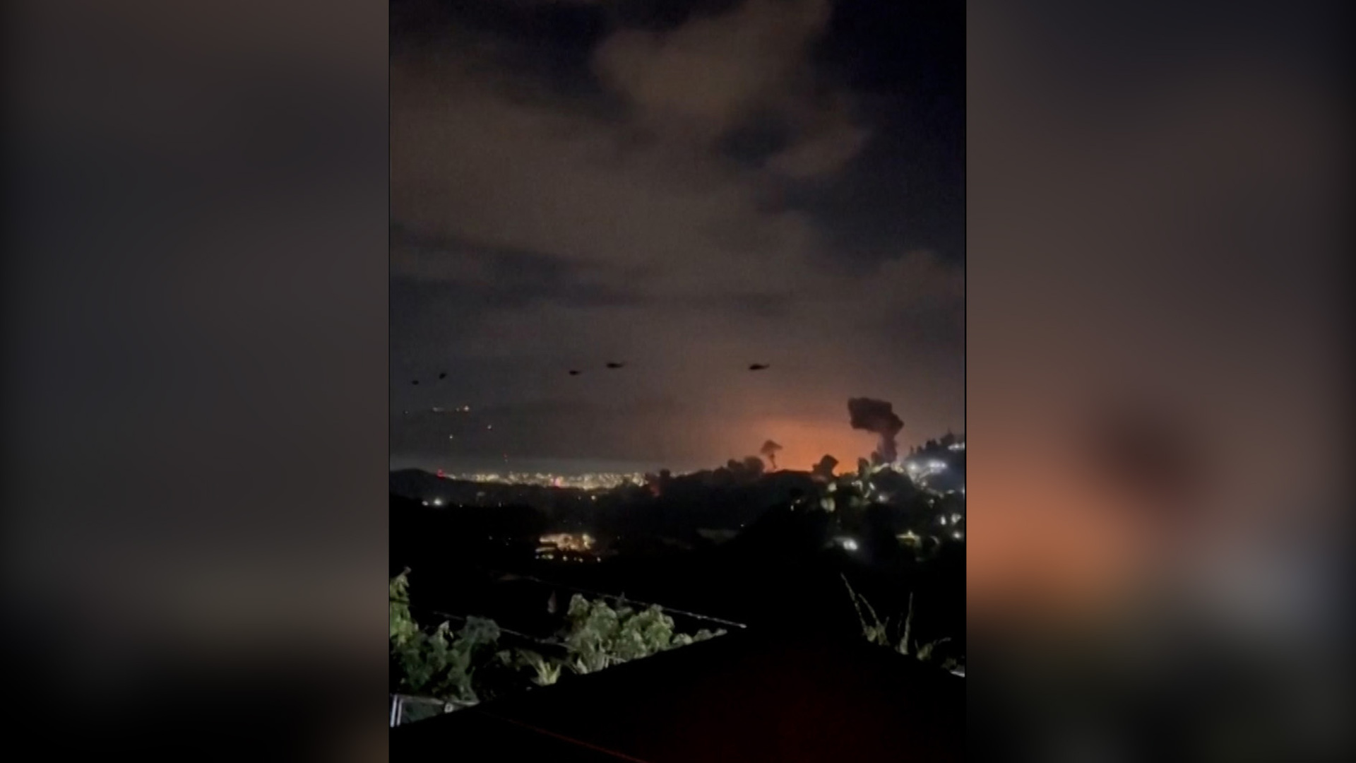 Helicopters seen over Venezuelan capital as explosions rock city