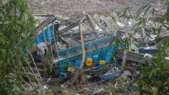 Rescuers race to find dozens missing in deadly Philippines landfill collapse