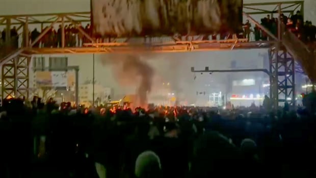 Iranian official warns against U.S. strikes as activists say protest death toll reaches 203