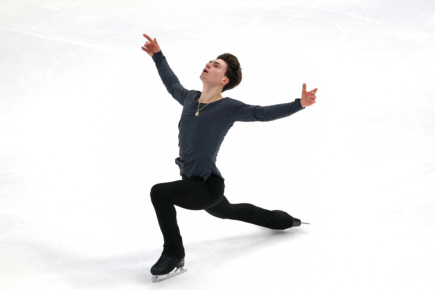Figure skater Maxim Naumov makes U.S. Olympic team a year after parents were killed in plane crash