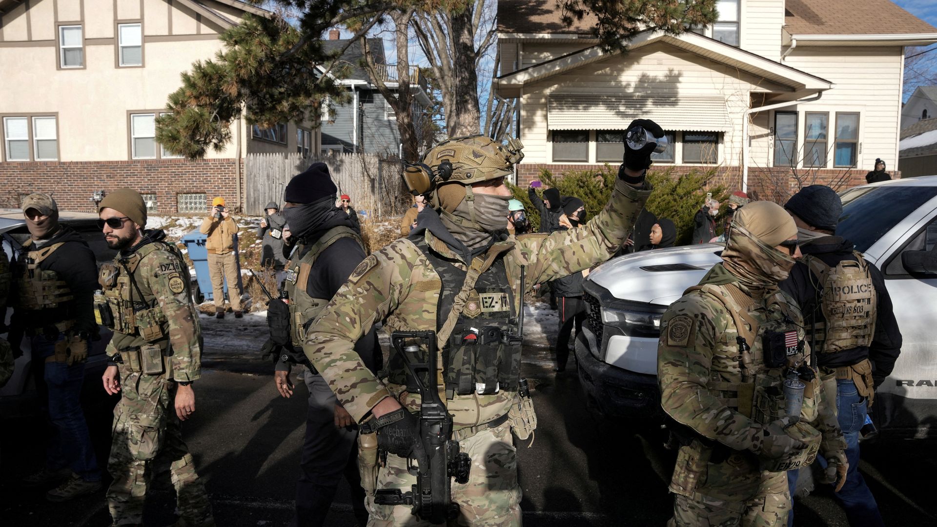 Hundreds more officers heading to Minnesota – as state sues Trump administration to block ICE agent surge