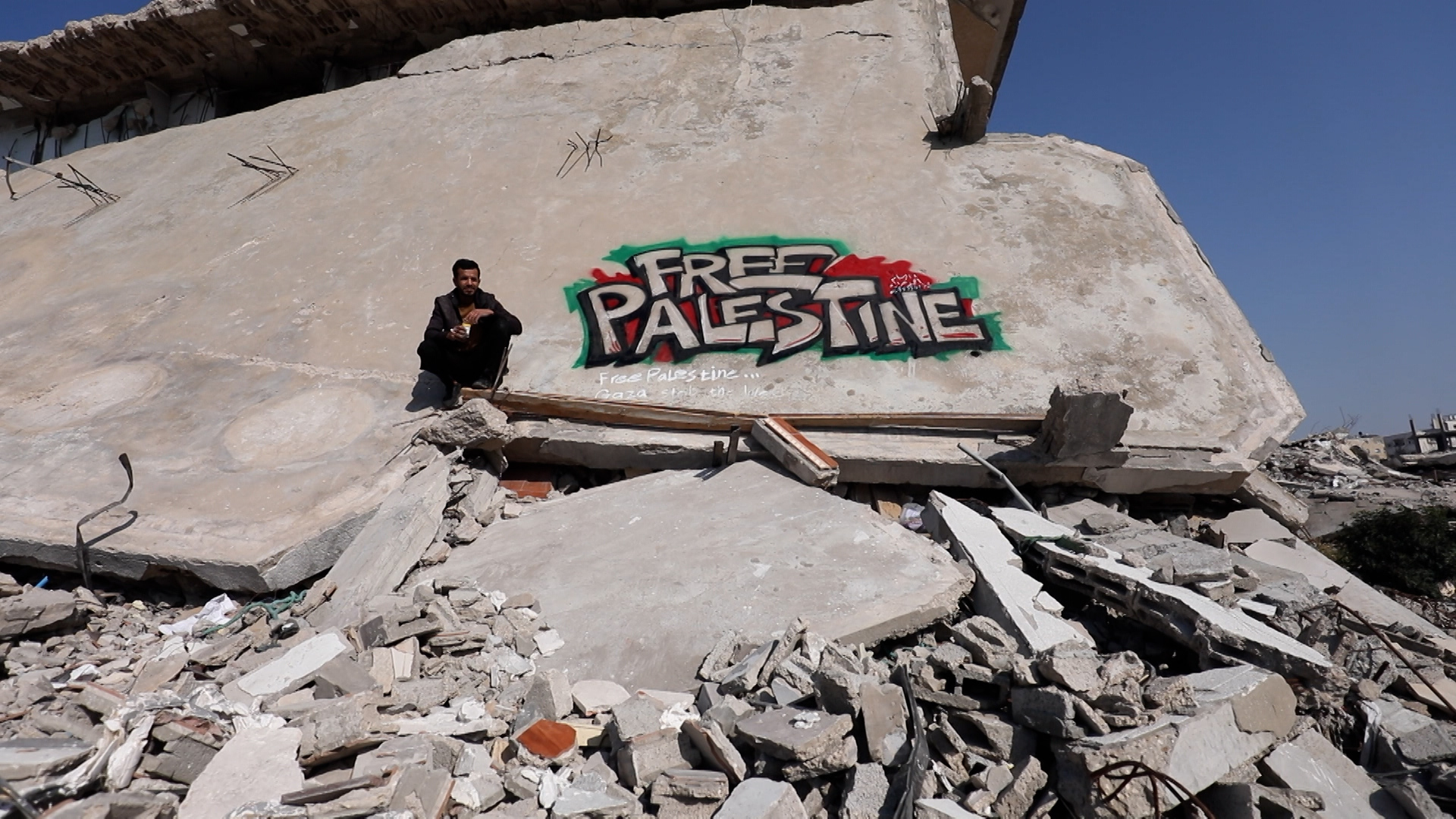 The Gaza graffiti artist using shattered buildings as a canvas