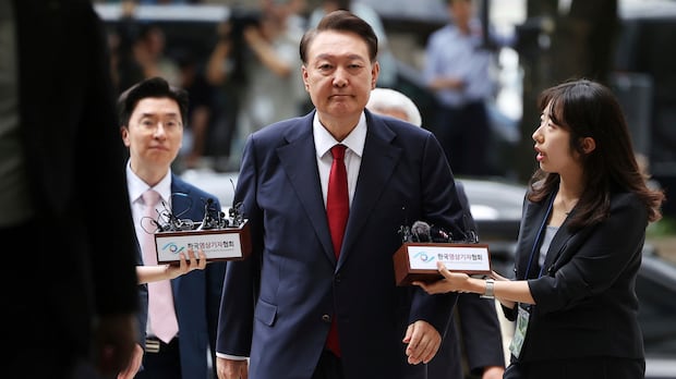 Former South Korea leader handed 5-year jail term for charges related to marital law