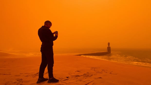 IN PHOTOS | Dust storm turns Libya a surreal orange
