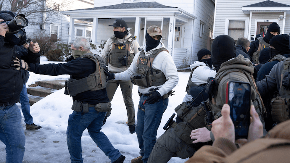 MAGA melts down over video of postal worker flipping the bird to immigration agents