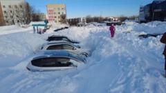 Record snowfall leaves cars stuck and people stranded in Russia’s Far East