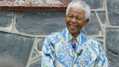 Mandela’s prison key, sunglasses and shirt can be sold after daughter wins court battle