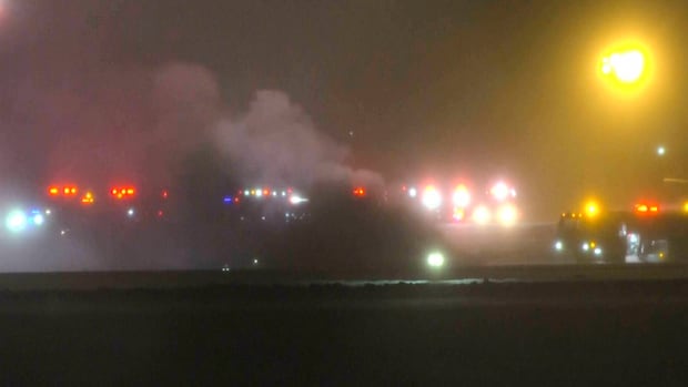 Private jet crashes in flames at Maine airport with 8 aboard