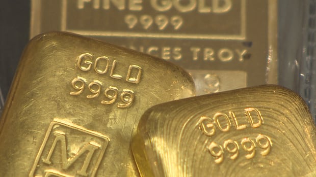 Gold hits record $5,000 US an ounce as months-long rally continues amid global turmoil