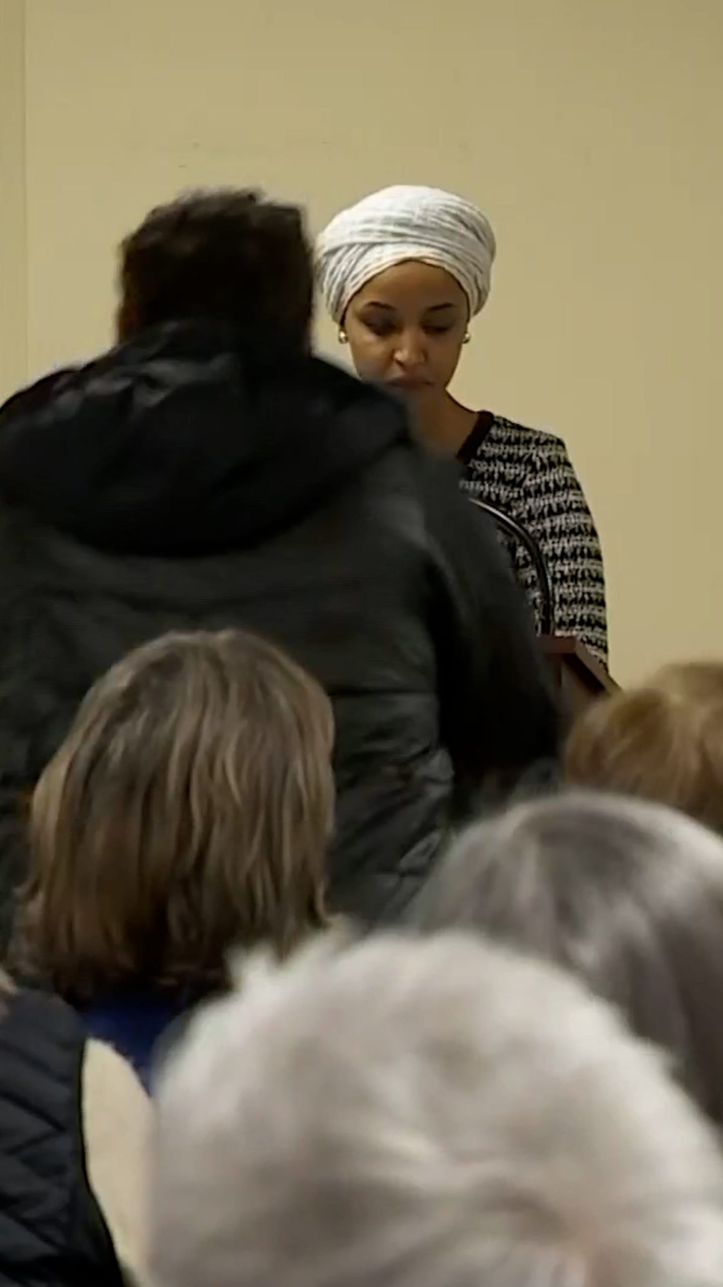 Man sprays Rep. Omar with unknown substance at town hall
