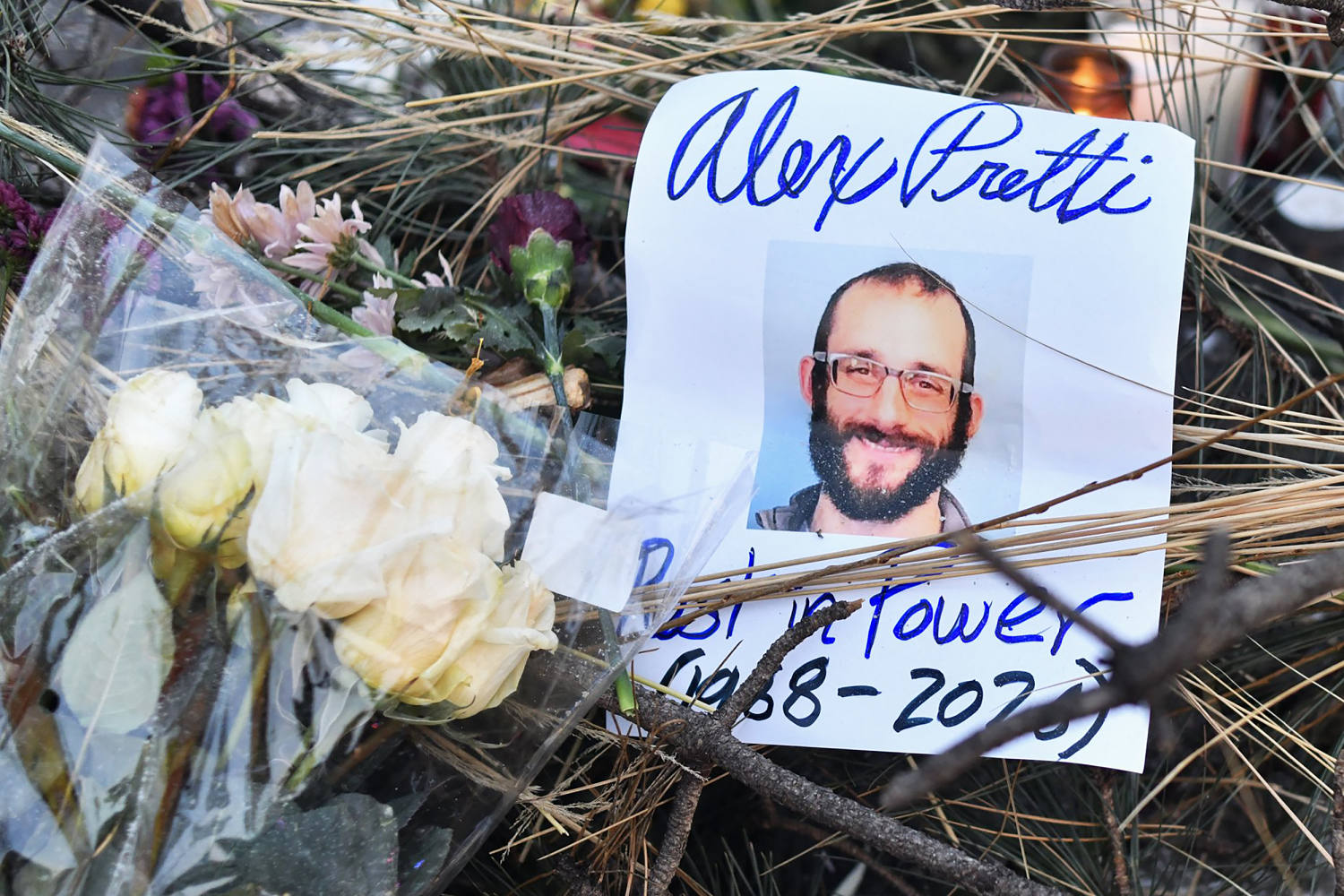 Two federal officers fired guns in Alex Pretti shooting, initial DHS report says