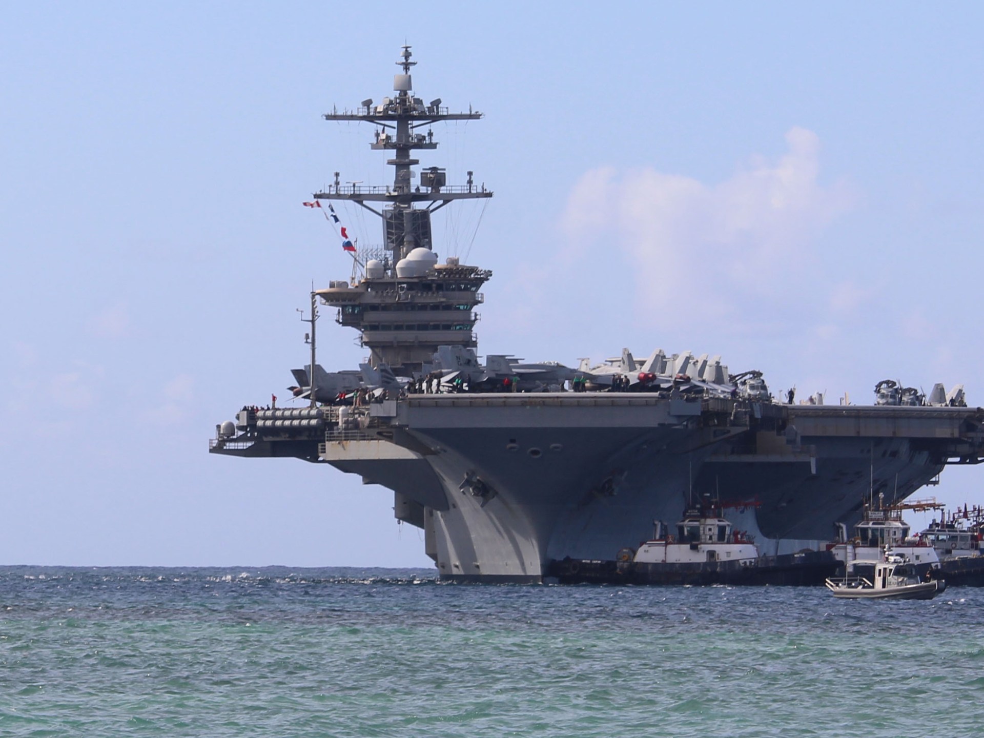 How does US military build-up off Iran compare to the June 2025 strikes?