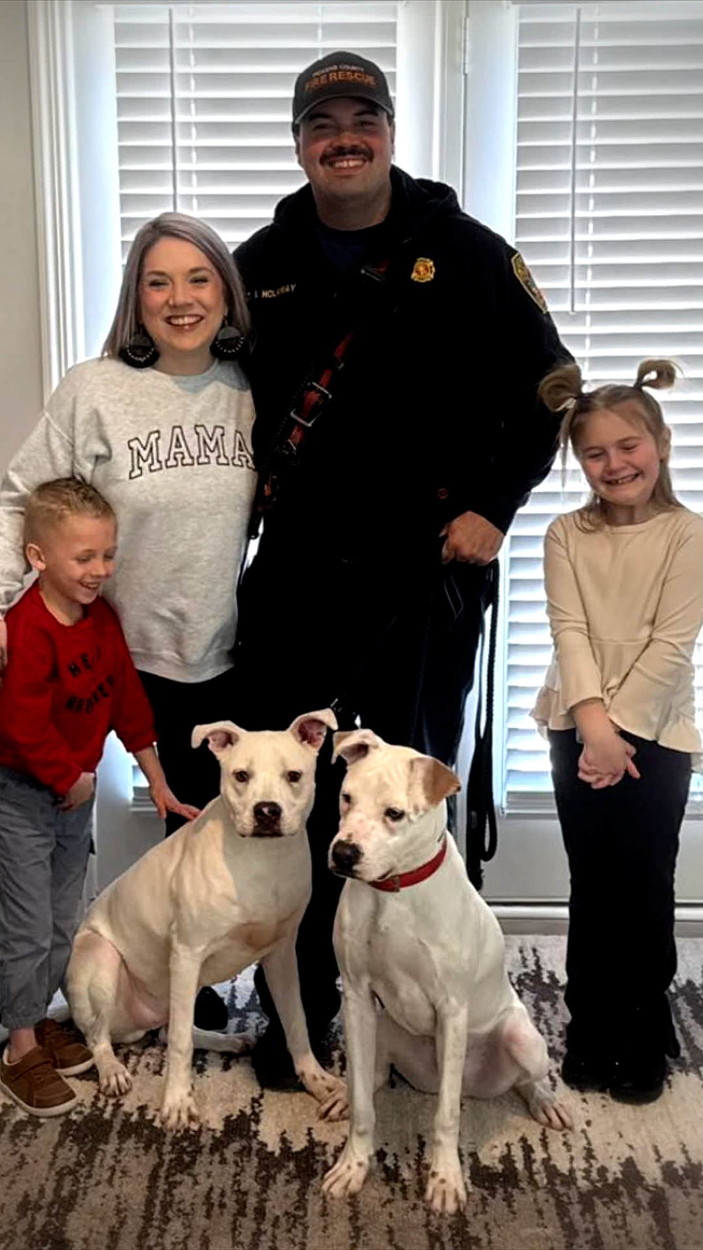 Firefighter adopts puppies he rescued from house fire