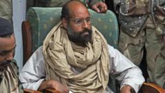 Libyan prosecutors launch probe into killing of Gaddafi’s son
