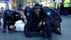 Australia police defend actions after violence at protest over Israeli president visit