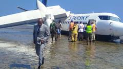 Pilot praised after crash-landing faulty Somali passenger plane on seashore