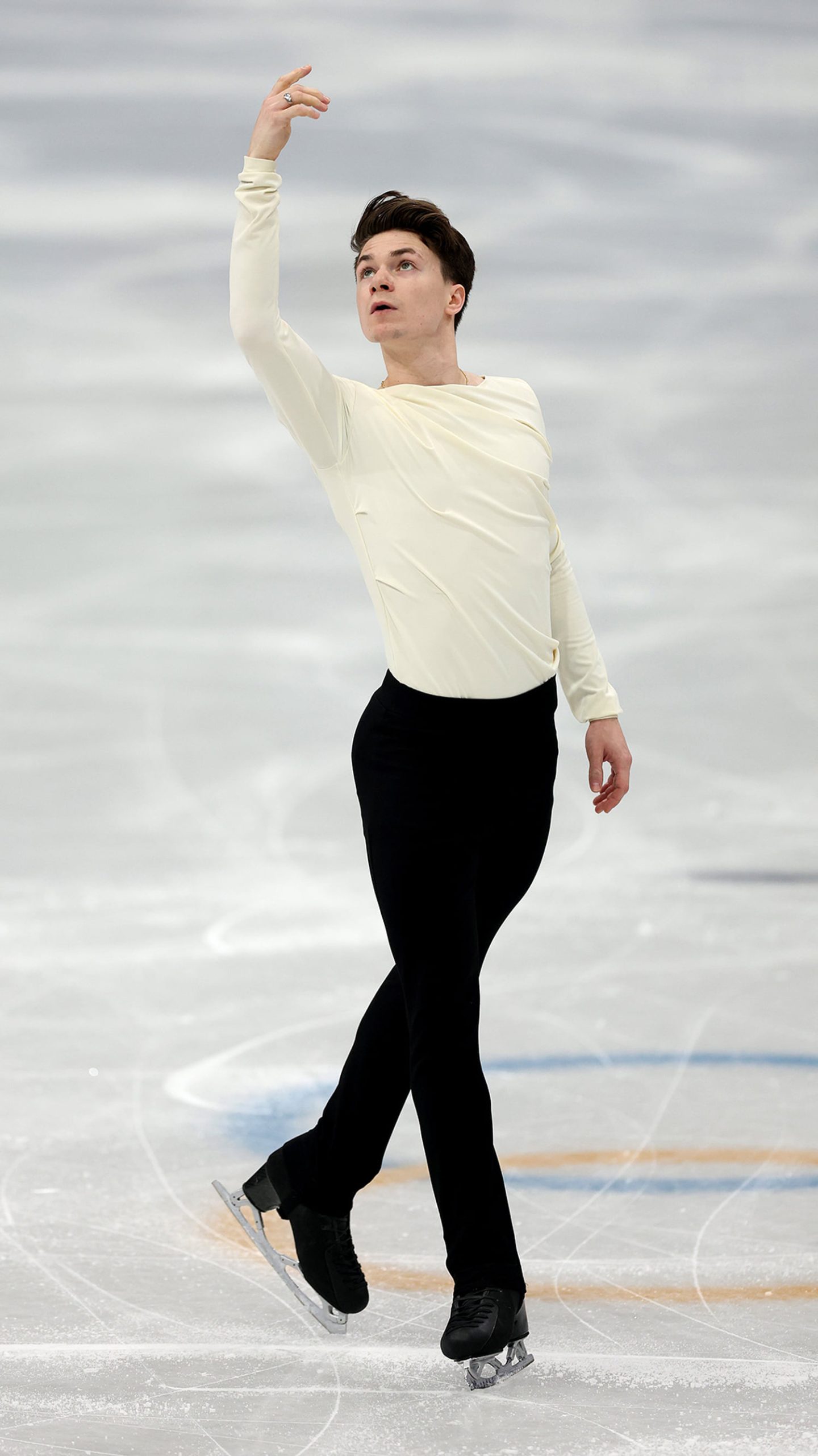 Maxim Naumov makes Olympic debut in tribute to parents