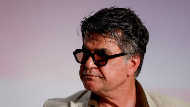 Oscar-nominated director Jafar Panahi says he will return to Iran despite looming arrest