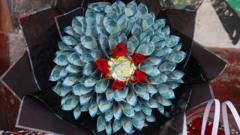 Kenyans drop flowers for Valentine’s bouquets of cash. Not everyone is impressed