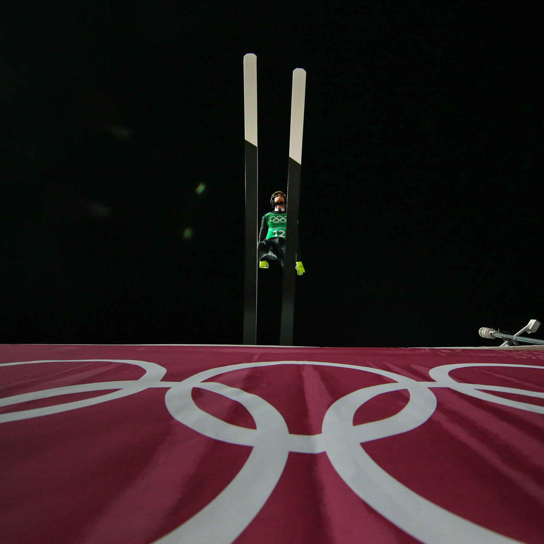 Could an Electronic Coach Help Ski Jumpers Leap Farther?